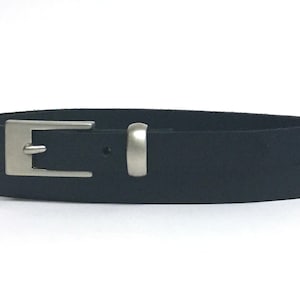 May include: A black leather belt with a silver buckle.