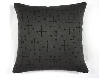 Maharam pillow - Charles and Ray Eames small dot pillow, 1947. Charcoal color. Black, Dark grey
