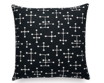 Maharam pillow Charles and Ray Eames small dot pillow. Black and white.