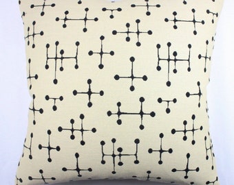 Maharam pillow cover.  Charles and Ray Eames Small Dot pillow - Color Document.