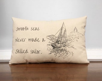 Smooth sees never made a skilled sailor pillow. Statement pillow. Quote Pillow. Nautical pillow.