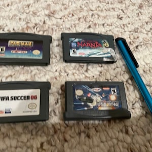 4 Game boy advance cartridges Phalanx , Narnia, Fifa Soccer 06, Pacman
