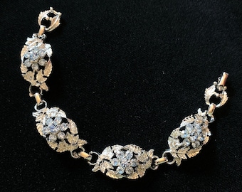 Vintage CORO Bracelet: Silver Tone Leaves, Light Blue Rhinestone Flowers, Early 60s – cod. A568b