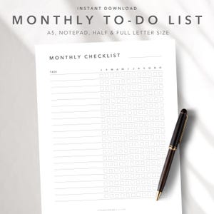 May include: A white monthly to-do list notepad with a checklist format. The notepad includes the text "MONTHLY TO-DO LIST" and "MONTHLY CHECKLIST". A black and gold pen rests on the notepad. The notepad is available in A5, notepad, half & full letter sizes.