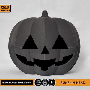 May include: A large, black EVA foam pumpkin head with a carved jack-o'-lantern face. The pumpkin has a stem and is set against a light gray background. Text on the image includes "EVA FOAM PATTERN" and "PUMPKIN HEAD".