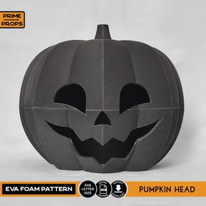 May include: A black EVA foam pumpkin head with a carved face. The pumpkin has large eye and mouth cutouts, and a stem at the top. The text "EVA FOAM PATTERN" and "PUMPKIN HEAD" are displayed on the bottom.