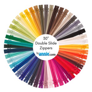 May include: A variety of 30-inch double slide zippers in different colors, including red, orange, yellow, green, blue, purple, pink, and brown. The zippers are arranged in a circle with the text "30" Double Slide Zippers by annie.com" in the center.