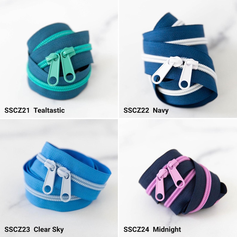 May include: Four coils of continuous zipper tape with double pulls. SSCZ21 Tealtastic is teal with matching pulls. SSCZ22 Navy is dark blue with white teeth and pulls. SSCZ23 Clear Sky is bright blue with light blue teeth and pulls. SSCZ24 Midnight is dark blue with pink teeth and pulls.