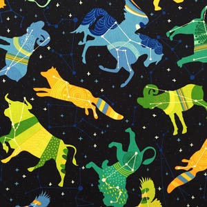 May include: A fabric featuring colorful animal constellations on a black background. The animals, including a fox, ram, and bull, are depicted in shades of yellow, green, and blue, with white constellation lines and stars.