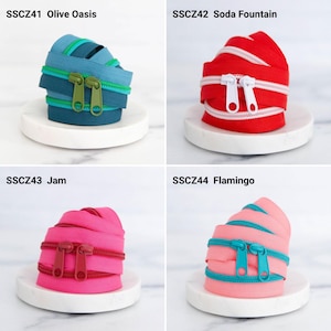May include: Four coils of nylon zipper tape with matching pulls. SSCZ41 Olive Oasis is blue with green pulls. SSCZ42 Soda Fountain is red with white pulls. SSCZ43 Jam is pink with dark red pulls. SSCZ44 Flamingo is light pink with teal pulls.