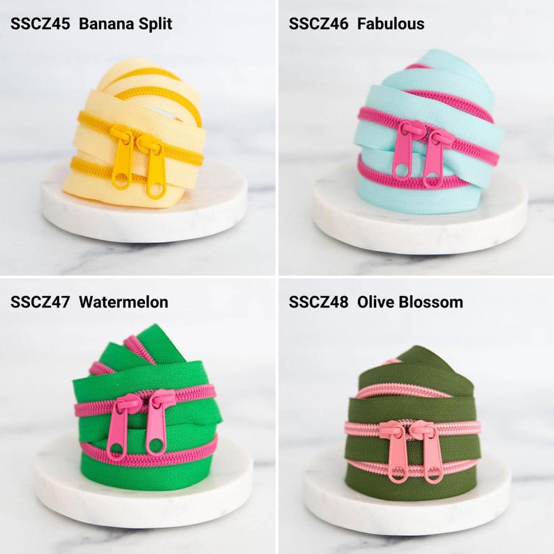 May include: Four coiled zippers with double pulls. SSCZ45 Banana Split is pale yellow with yellow pulls. SSCZ46 Fabulous is light blue with pink pulls. SSCZ47 Watermelon is bright green with pink pulls. SSCZ48 Olive Blossom is olive green with pink pulls.
