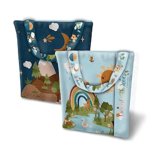 May include: Two tote bags with colorful illustrations. One bag features a night scene with a moon, stars, and mountains. The other bag has a rainbow, sun, and a river scene. The straps have numbers and animal designs. Text on the side of one bag reads "Created with Love".