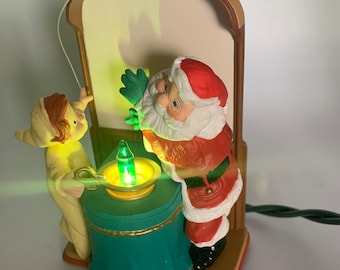 "Markenandenken 1998 ""Santa und sein magisches Licht"" leuchtendes Ornament."