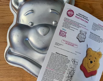 Wilton vintage Winnie the Pooh cake pan retired. 12 inch cake pan, great condition with printed  instructions.