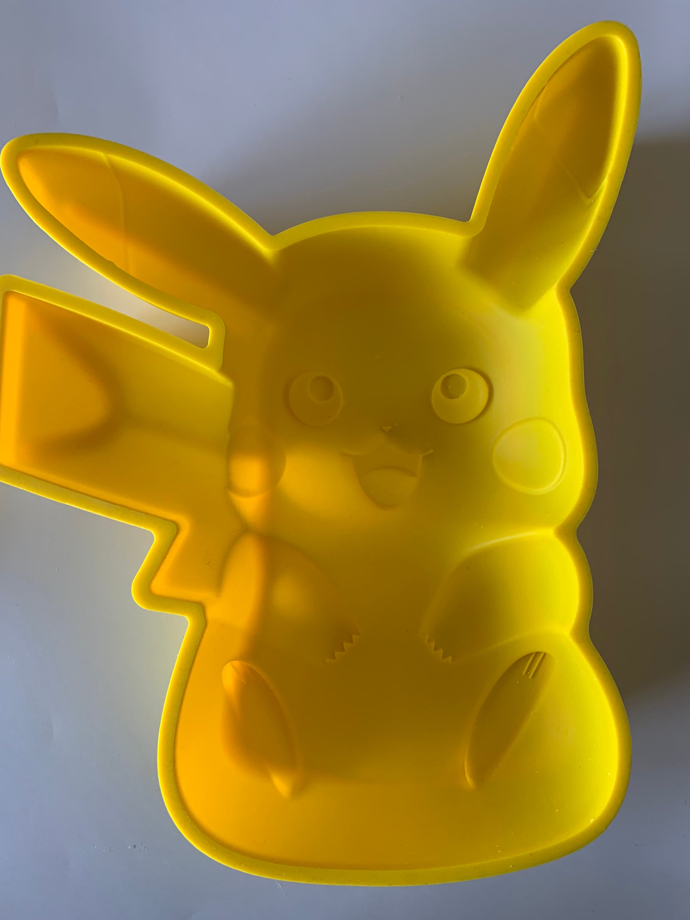 Pikachu silicone cake pan, Pokémon Pikachu silicon cake mold, chocolate,  and more. Pokémon Birthday cake.