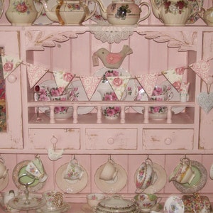 pink welsh dresser Had this old Welsh dresser given to us when we moved into our house in France. We finally got new cupboards and relegated this to my big draughty art room (former hay