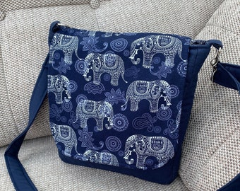 Elephant print, crossbody, messenger bag in navy cotton fabric, with adjustable shoulder strap.