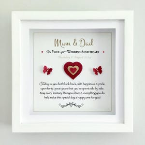 May include: A set of three ceramic mugs with a speckled, matte finish in cream, light grey, and dark grey. Each mug has a simple, minimalist design and a rounded handle.