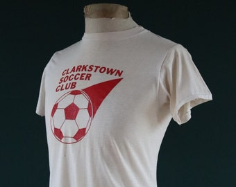 Vintage 1980s 80s 50/50 off white Clarkstown soccer football printed t shirt 33” chest