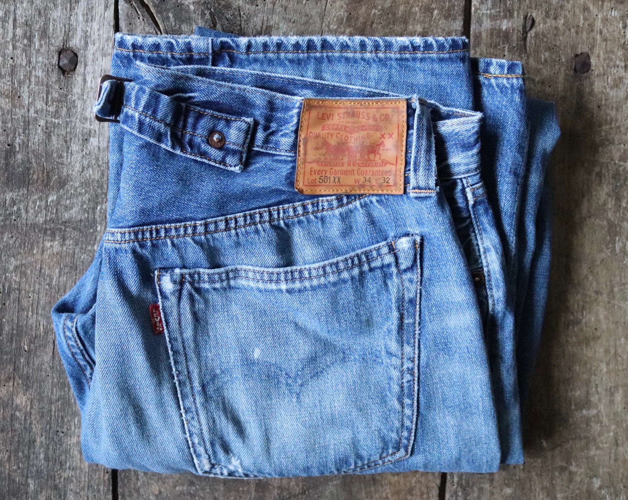 Vintage Levi Strauss Levis denim selvedge big e red tab jeans 501 501XX  buckle cinch back 33” x 31” indigo workwear work chore button fly
