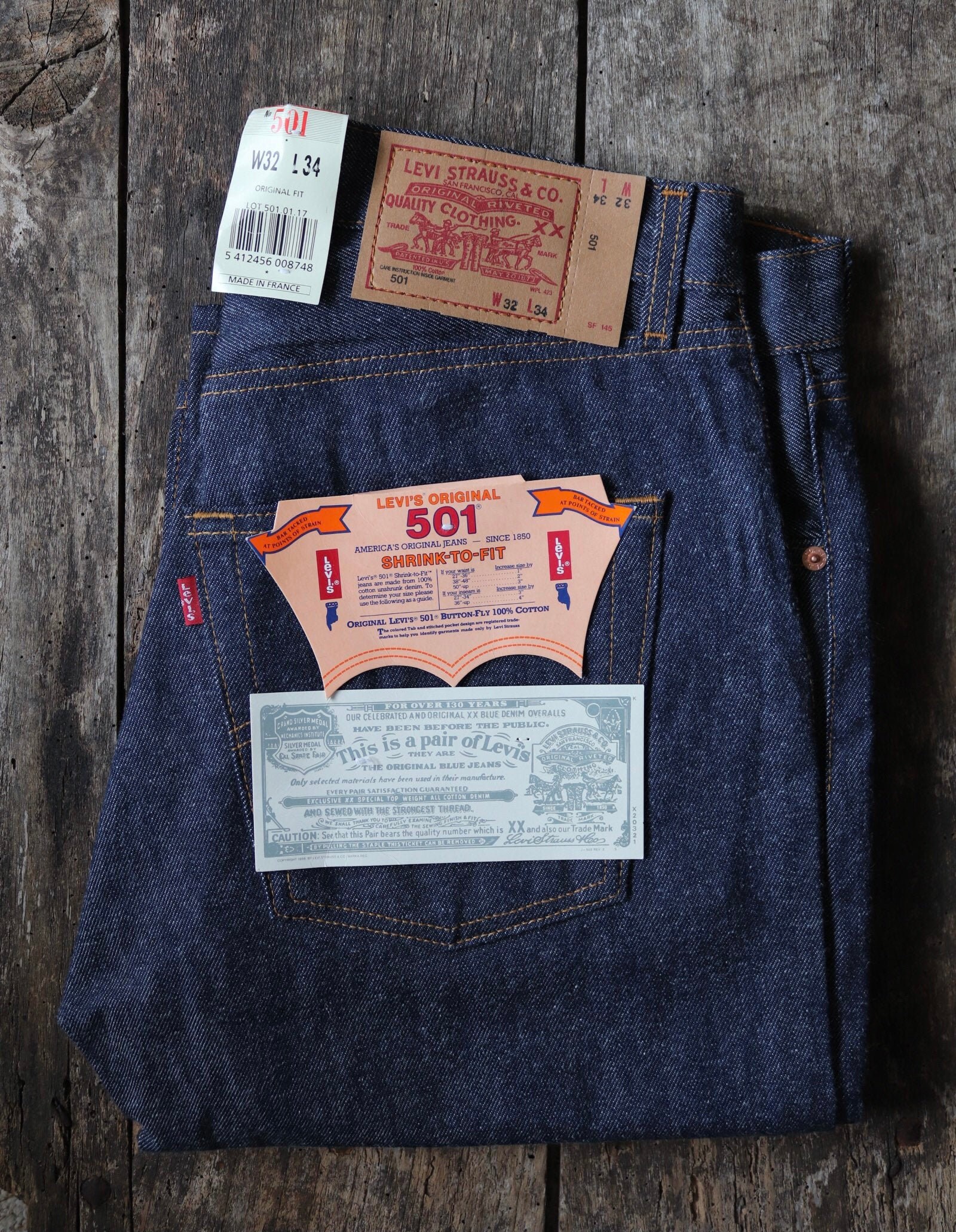 Vintage 1990s 90s deadstock Levis Levi Strauss 501 indigo denim jeans small  e red tab 32” x 34” shrink to fit