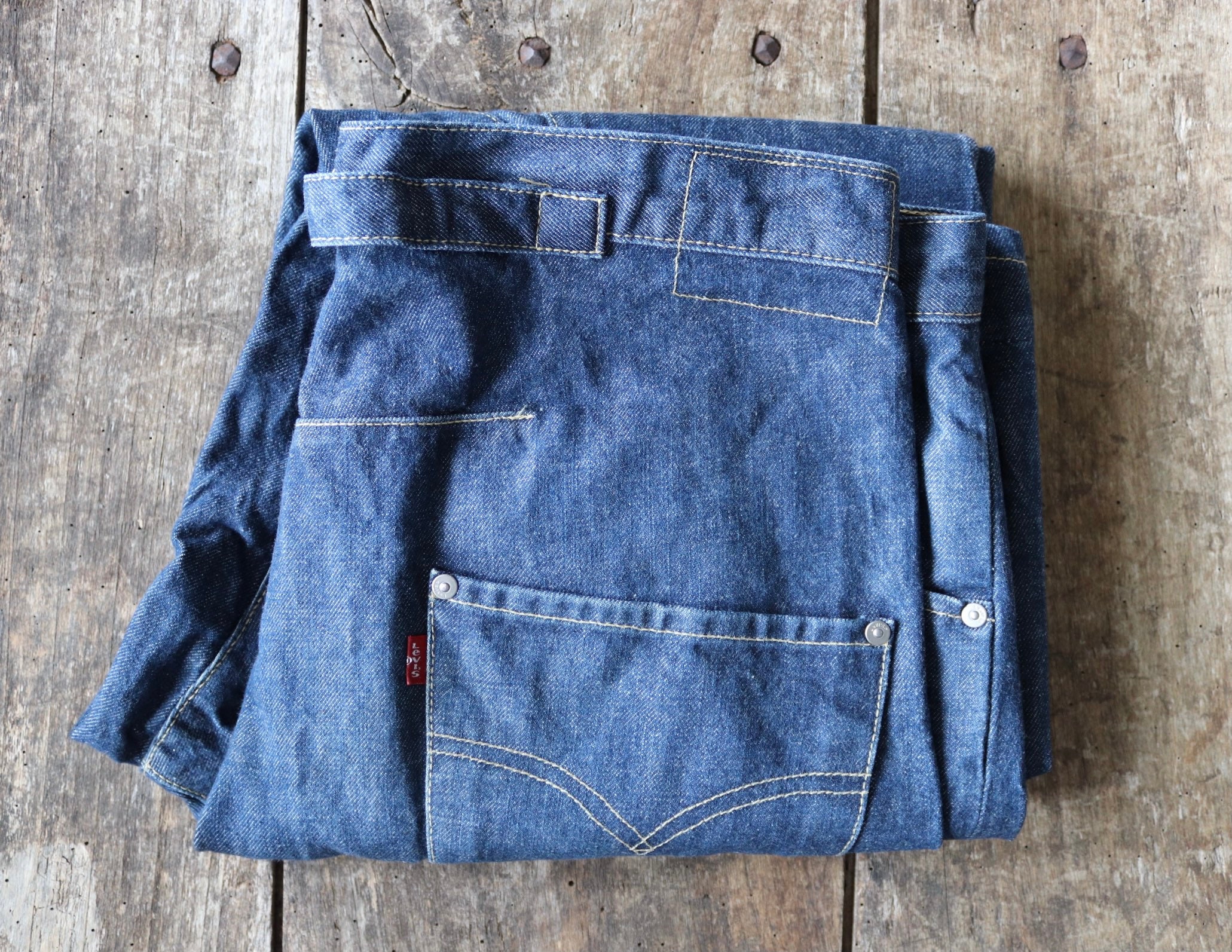 Vintage 2000s 00s Levis Levis twisted denim jeans single pocket buckle cinch back x 34” series 2