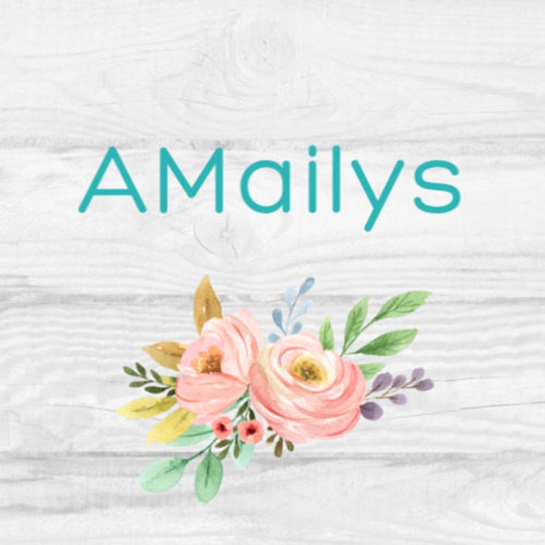 May include: A white wooden background with the text "AMailys" in teal blue lettering. A watercolor floral arrangement of pink and yellow flowers with green leaves is below the text.