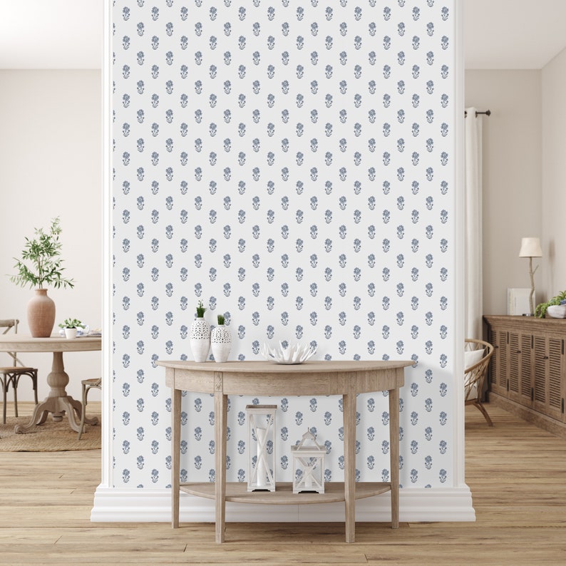 A sophisticated room with the same high-quality hydrangea wallpaper. It's complemented by a rustic wooden console table and minimalist decor.