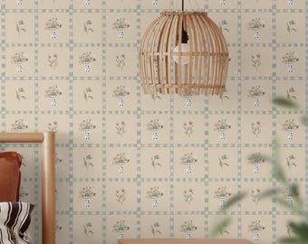 May include: A bedroom interior with a light brown wooden bed, a nightstand, and a hanging light fixture. The walls are covered in a beige wallpaper with a repeating pattern of small floral bouquets in blue and white vases. The wallpaper has a checkered pattern in a light blue color.