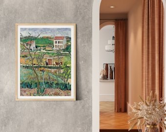 May include: A framed painting of a rural landscape with two white houses, green trees, and a cloudy sky. The painting is in a wooden frame and is hanging on a gray wall.