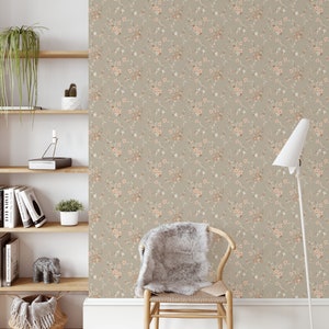 Rustic floral peel and stick wallpaper adding a touch of country charm to a minimalist study with floating shelves.