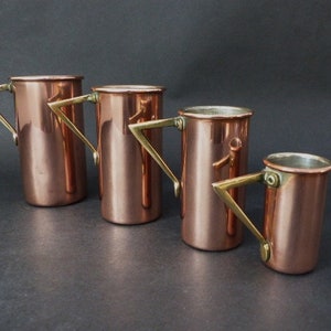 Antique Graduated Copper Measures - Four Art Deco Copper Measures
