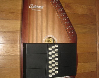 os210 festival autoharp value