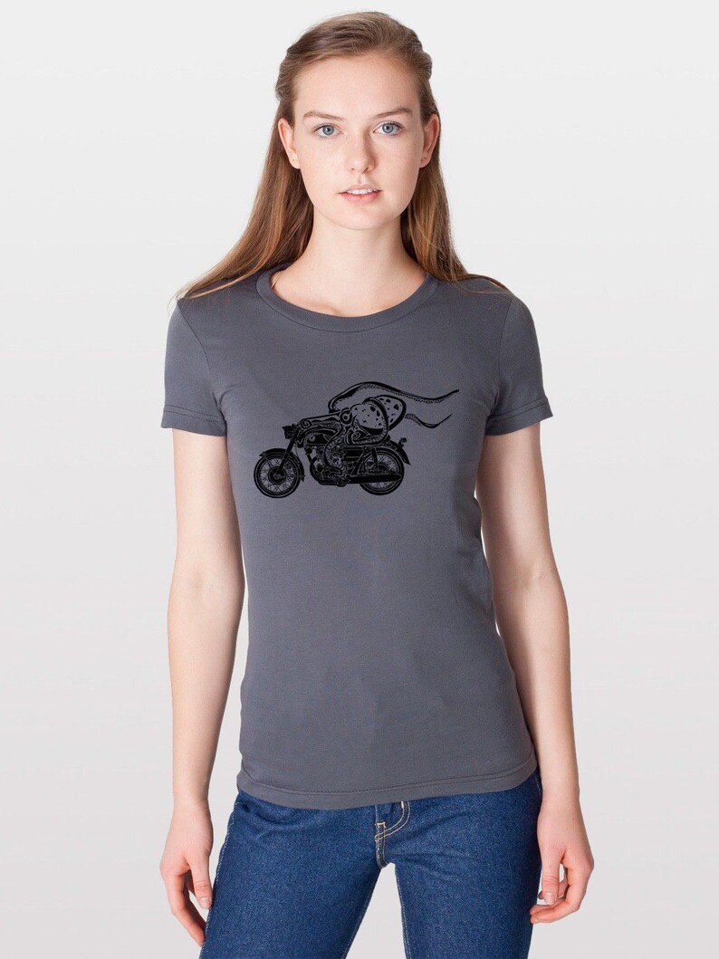 May include: A charcoal grey t-shirt with a black graphic of an octopus riding a motorcycle.