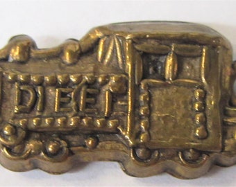 DIESEL LOCOMOTIVE train copper plated charm gumball machine Cracker Jack c.1950