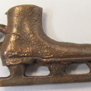 ICE SKATE verkoperde bedel kauwgomballenautomaat Cracker Jack ca.1950
