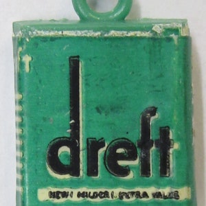 May include: Green plastic keychain with a white and black logo that says "Dreyf's New Milder Extra Value".