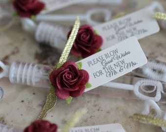 ASSEMBLED wedding bubbles with burgundy roses, bubble send off, bubble wands, burgundy and gold wedding details, wedding send off