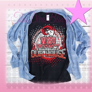 May include: Black t-shirt with a red and white graphic design featuring a ram mascot and the text "WSSU Respect Our House".