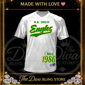 May include: A white V-neck jersey with short sleeves and a mesh texture. The front features the green text M.B. SMILEY, the word Eagles in green with a yellow outline, and the green text Class of 1986 above a small size S tag on the lower right.