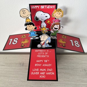 Tarjeta en caja de Snoopy