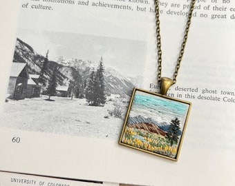 Hand Embroidered Necklace Pendant - Sunset Sunrise Landscape Mountain Scene on Cotton Fabric - Antiqued Bronze Gold