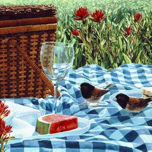May include: A picnic scene featuring a wicker basket, a wine glass, and a slice of watermelon on a blue and white checked blanket. Two small birds are nearby. Red flowers and green foliage are in the background.