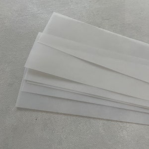 Blank clear vellum bands at 1.5 inches by 11 inches long.