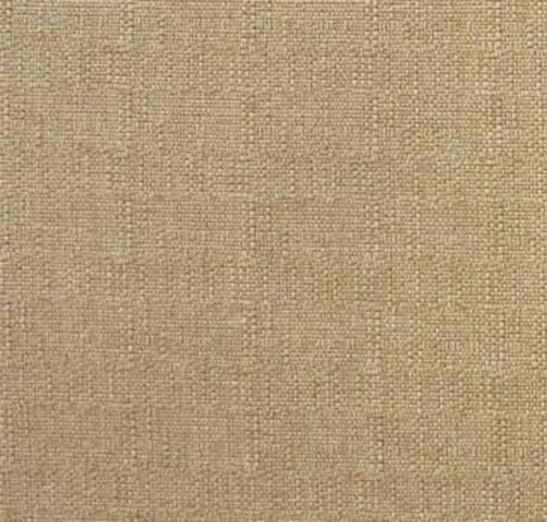 May include: A close-up of a beige woven fabric with a subtle texture.