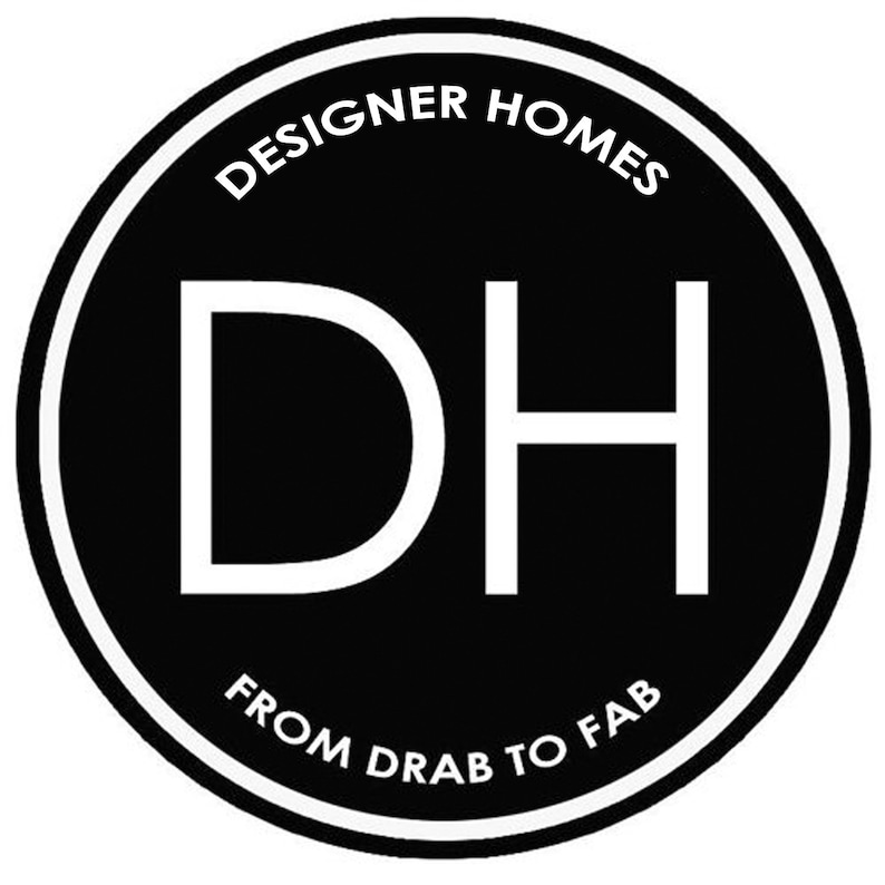 May include: Black and white logo with the text "DESIGNER HOMES" and "DH" in a large font. The text "FROM DRAB TO FAB" is below the logo.