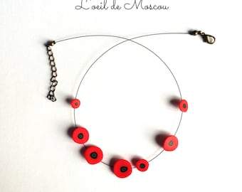 red poppy flower necklace on black thread