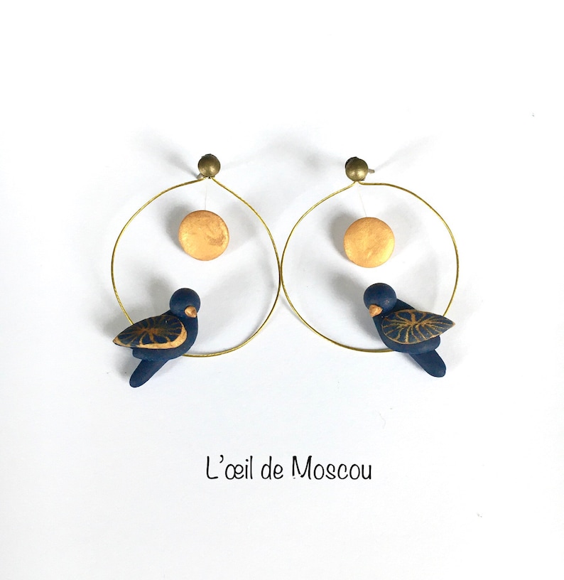 designer midnight blue and gold moonlight bird earrings, hand modeled image 1