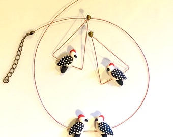 Conjunto de collar y pendientes de pico picapinos