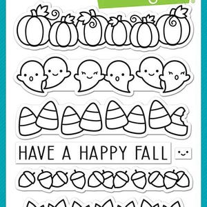May include: Clear photopolymer stamps with a fall theme. The stamps feature pumpkins, ghosts, candy corn, acorns, leaves, and apples. The text "HAVE A HAPPY FALL" is also included.